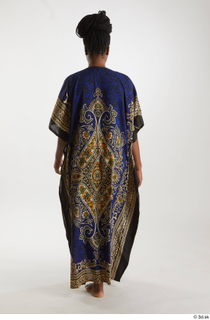 Dina Moses  1 back view dressed traditional decora long…